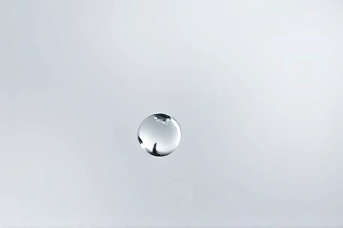 Close-up of liquid droplets symbolizing precise medical delivery.